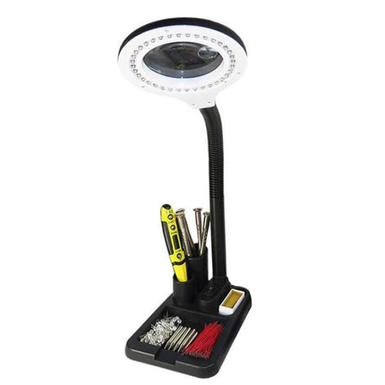 Desk lamp with magnifying glass and tool holder on a white background
