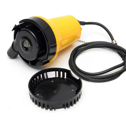 Yellow and black underwater camera with cable on a white background