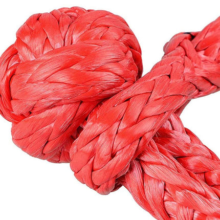Close-up of a red rope with a knot on a white background