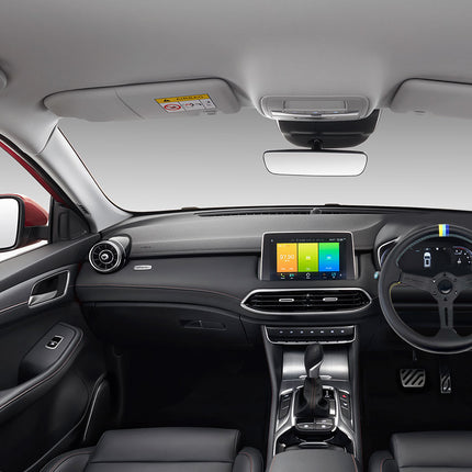 Front interior view of a modern car showing the dashboard, center console, infotainment screen, steering wheel, seats, and sun visors.