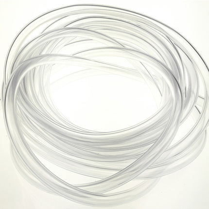 Coiled white cable on a light beige background