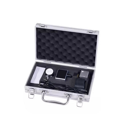 Silver briefcase with black interior containing electronic devices on a white background