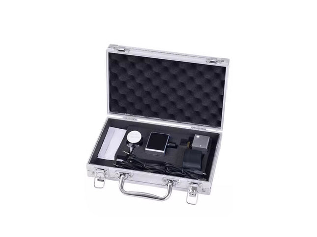 Silver briefcase with black interior containing electronic devices on a white background