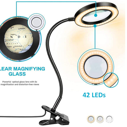 Table lamp with magnifying glass and LED details on a white background