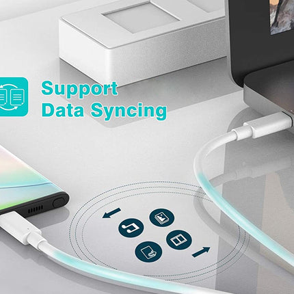 Laptop, smartphone, and charging cable on a glass surface with 'Support Data Syncing' text.