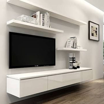 Modern living room with a television mounted on a white wall, flanked by shelves and decor.