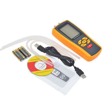 Digital multimeter with accessories on a white background