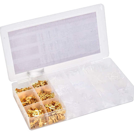 Open white box with gold-colored components on a white background