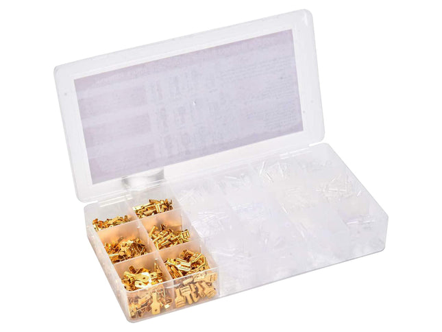 Open white box with gold-colored components on a white background