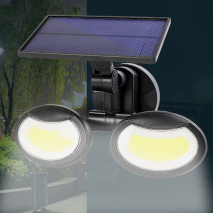Solar-powered outdoor light fixture with two bright lights and a solar panel on top.