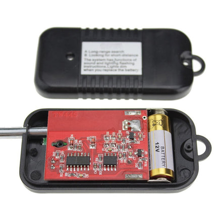 Electronic device with red circuit board and black casing on a white background