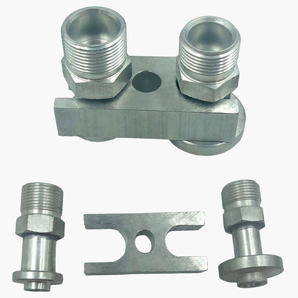 Set of metal plumbing components on a white background