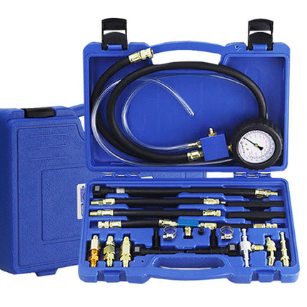 Blue tool kit with automotive diagnostic tools and hose on a white background