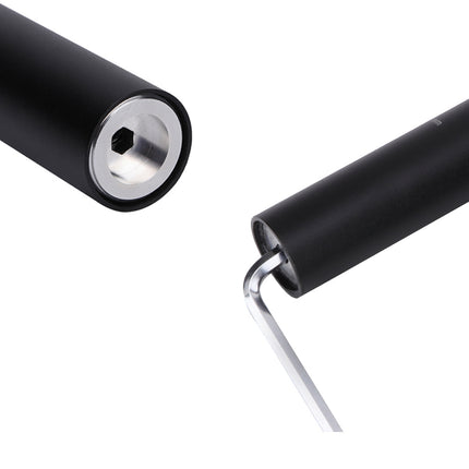 Black roller with a silver handle on a white background