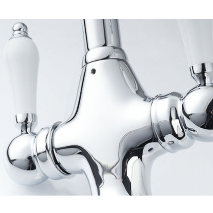 Chrome bathroom faucet on a white background
