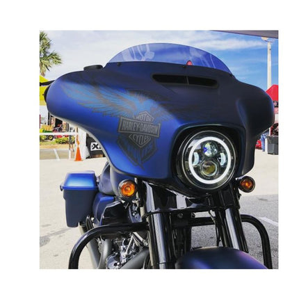 Blue motorcycle with visible brand logo on a blurred background