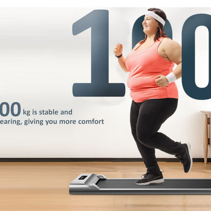 Person using a treadmill with text indicating weight capacity