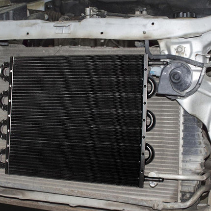 Car radiator inside a vehicle with open hood