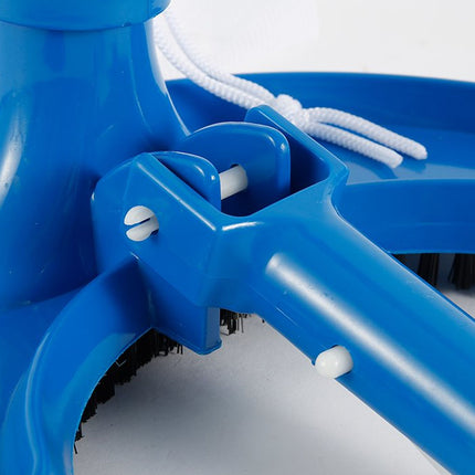 Close-up of a blue cleaning tool with brush head on a white background