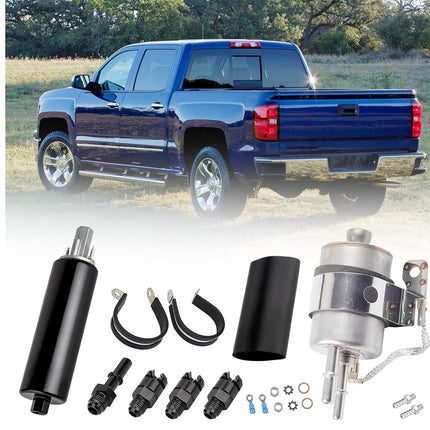 Blue truck in a field with automotive parts displayed below