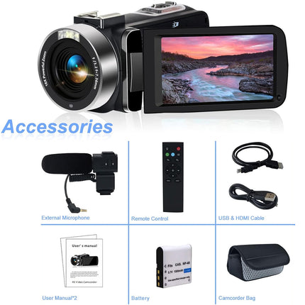 Digital video camera with accessories on a white background
