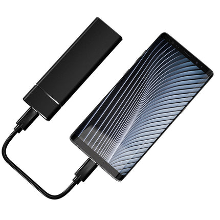 Black USB drive with a sleek design on a white background