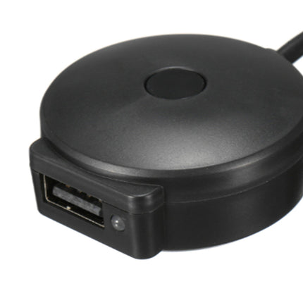 Black round USB device with a cable on a white background