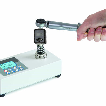 Digital打压机 (Digital Press Machine) with a hand applying pressure