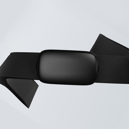 Black car side mirror on a light gray background