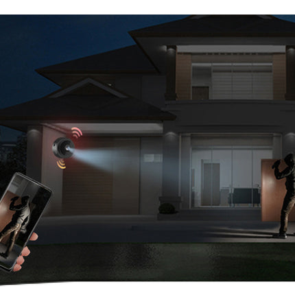 Smart home security system with a person using a phone and a person approaching a house.
