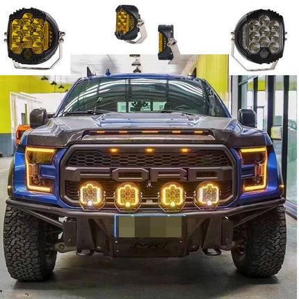 Four pairs of off-road LED light bars with black housings and bright yellow lenses, shown both individually at the top and mounted on the front bumper of a blue Ford pickup truck.
