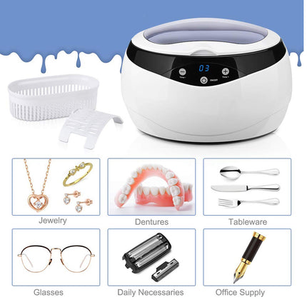 White ultrasonic cleaner with digital display and various items it can clean.