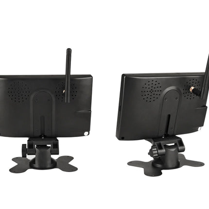 Two black electronic devices with antennas on a white background