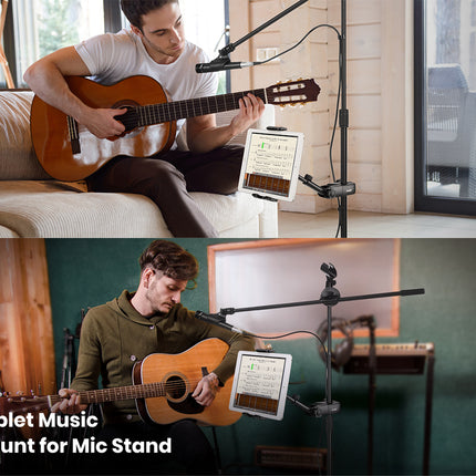 Two people playing guitar with a tablet music mount for mic stand in a home setting.