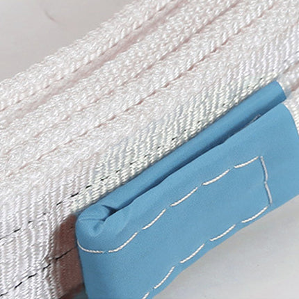 Close-up of a blue fabric patch on white woven material