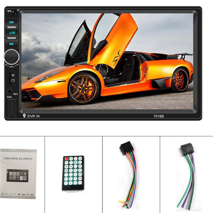 Car multimedia player displaying an orange sports car, with remote control and cables on a white background.