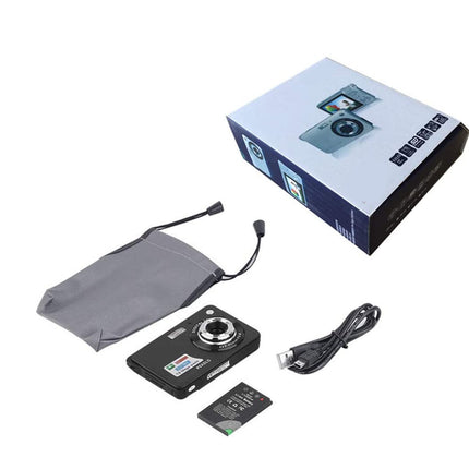 Digital camera set with packaging, lens cap, USB cable, and memory card on a white background