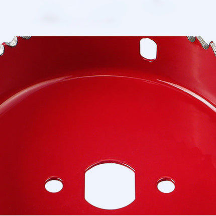 Red circular saw blade with metallic teeth on a white background