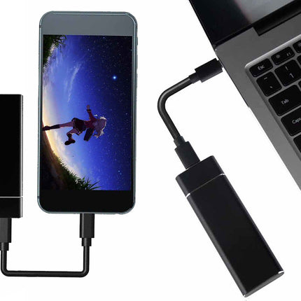 Phone with screen magnifier attached to a laptop on a white background