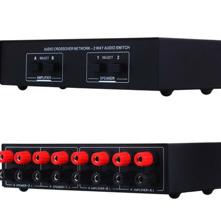 Black audio crossover network switch with red and black connectors on a white background