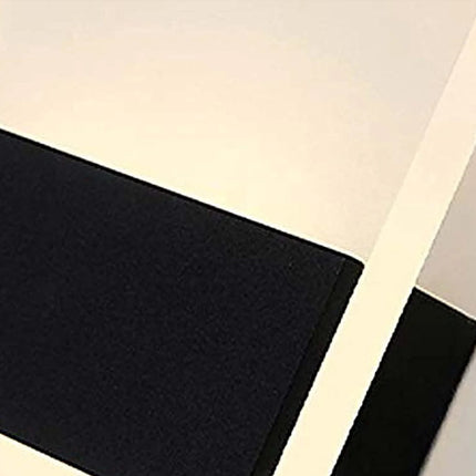 Black fabric on a light gray background