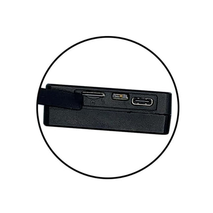 Black electronic device with ports on a white background