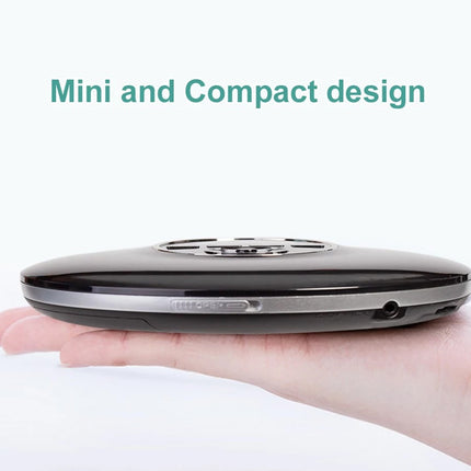 A slim black electronic device shown resting on a person's hand to demonstrate its compact size, with the text 'Mini and Compact design' above it on a white background.