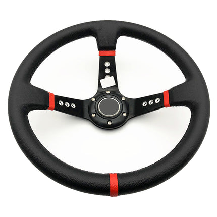 A black leather racing steering wheel with red accent stripes and a black three-spoke center, shown on a solid white background.