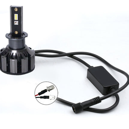 Black LED car light bulb with a cooling fin base, connected to a black power cable and inline switch, shown on a white background with a circular inset showing connector details.