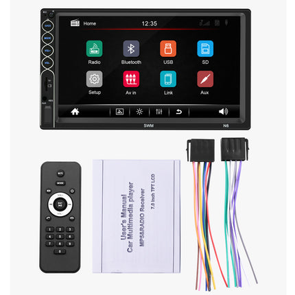 Car multimedia player with remote control, user manual, and wiring harness on a white background