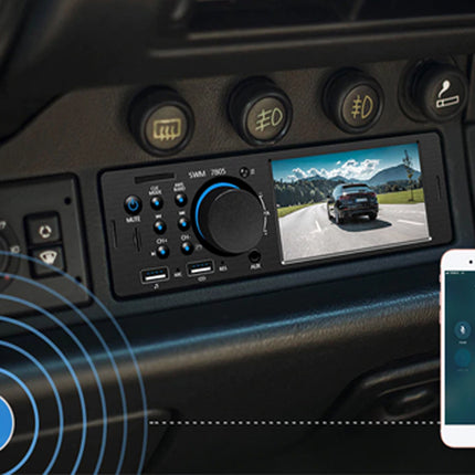 Car dashboard with multimedia system and smartphone displaying app interface
