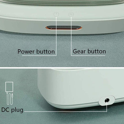 Close-up product diagram showing a white electronic device with labeled buttons and a DC plug: Power button, Gear button, and DC plug, on a gray textured background.