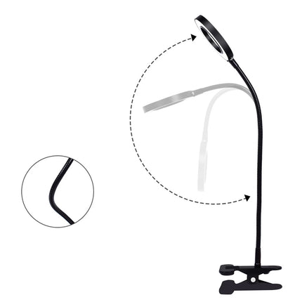 Black adjustable desk lamp with a clip on a white background