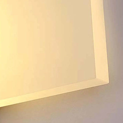 Light fixture on a white wall